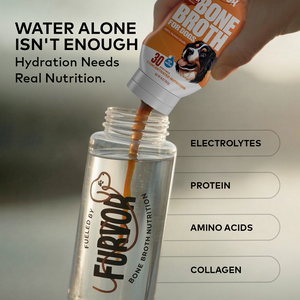 Furvor Chicken Bone Broth concentrate pouring into a water bottle — electrolytes, protein, amino acids, and collagen